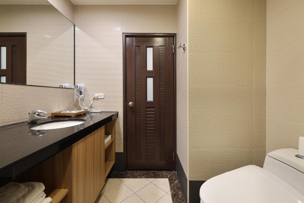 Koupelna v ubytování Shante Hotel Shitou