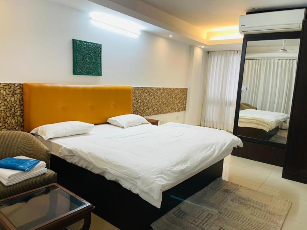 Een bed of bedden in een kamer bij villa