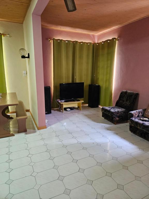 TV a/nebo společenská místnost v ubytování Residence Les Preverts