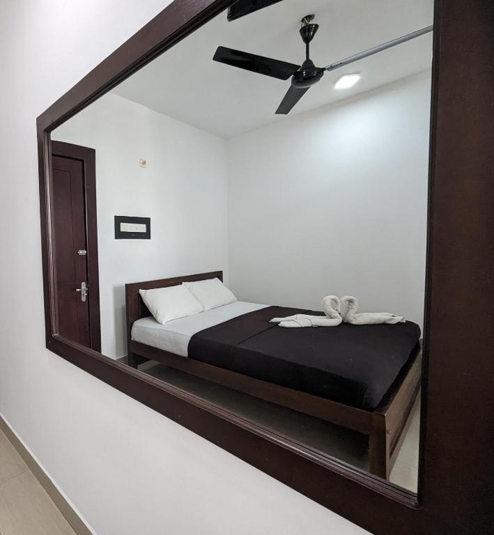 Postel nebo postele na pokoji v ubytování Big John Hotel