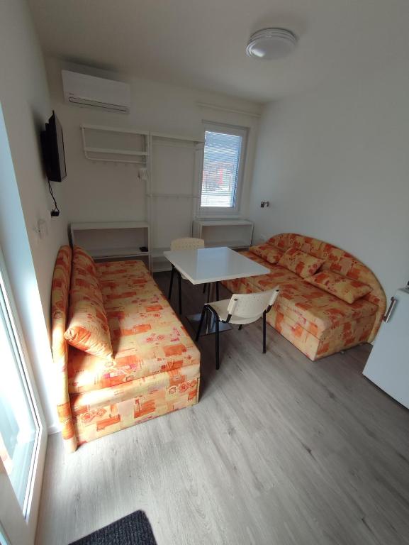 Posezení v ubytování BÖJTÖS apartmány NESVADY