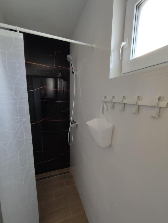 Koupelna v ubytování BÖJTÖS apartmány NESVADY