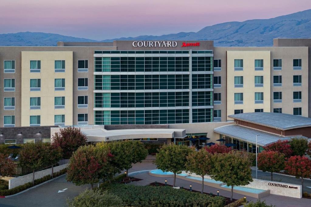 an aerial view of a building with a hotel at Courtyard by Marriott San Jose North/ Silicon Valley in San Jose