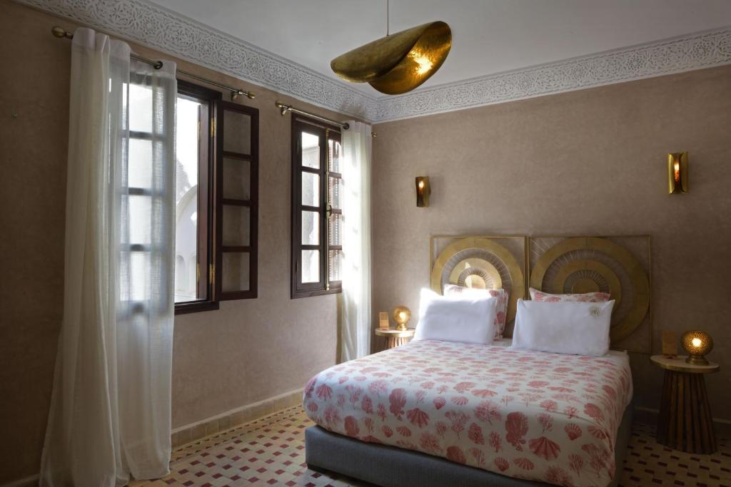 Postel nebo postele na pokoji v ubytování Riad Palau Marrakech