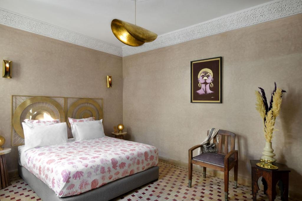 Postel nebo postele na pokoji v ubytování Riad Palau Marrakech