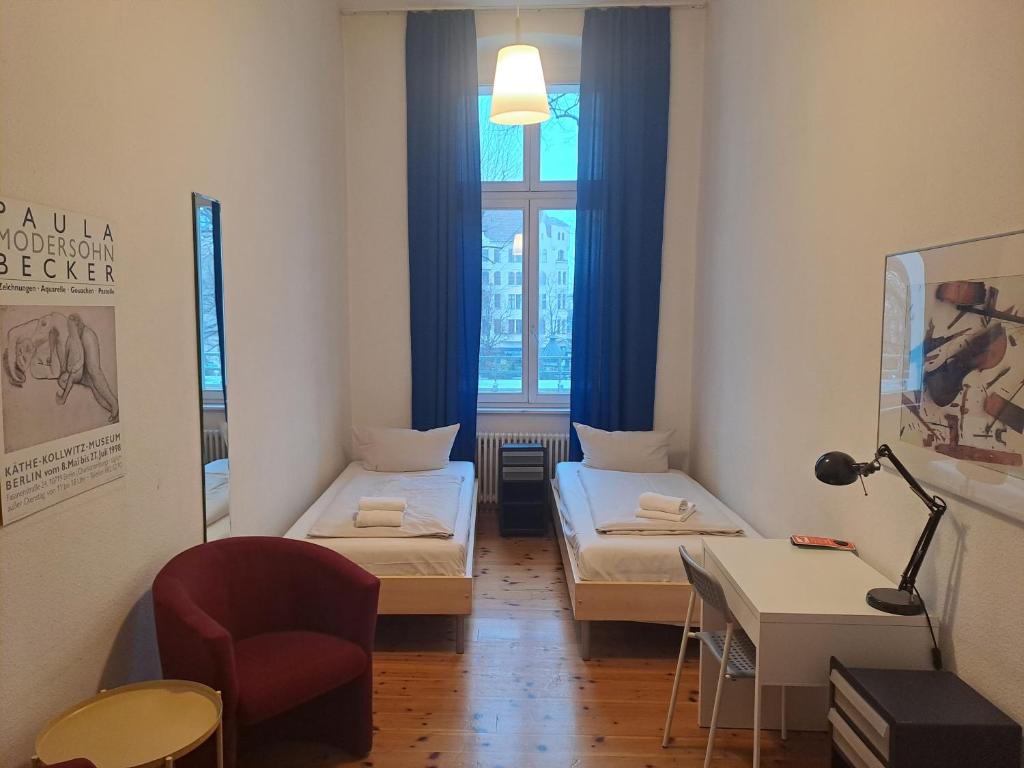 Postel nebo postele na pokoji v ubytování Pension Peters – Das andere Hotel