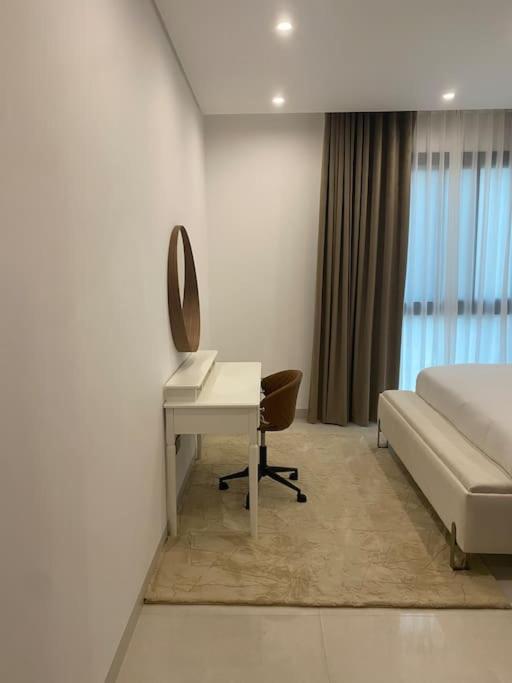 Postel nebo postele na pokoji v ubytování Beachfront 2BHK apartment at Al Mouj