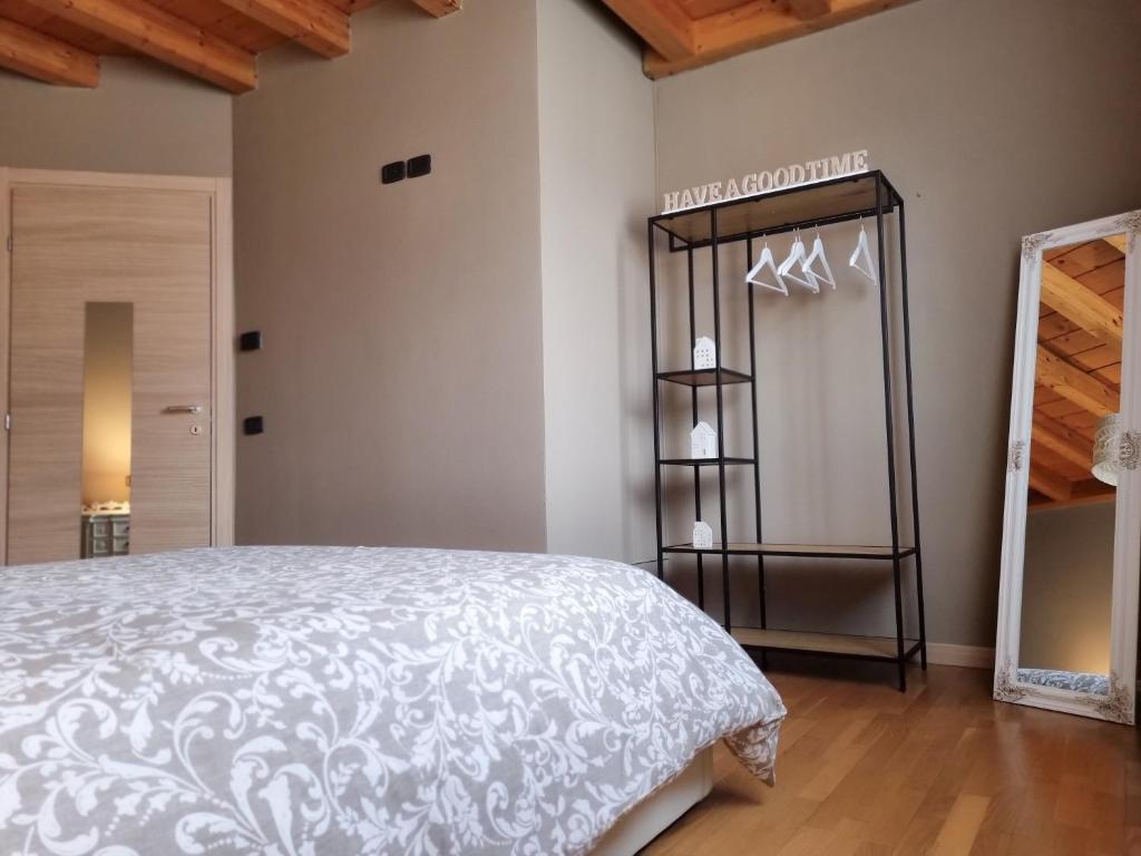 Postel nebo postele na pokoji v ubytování Loft Civico 12