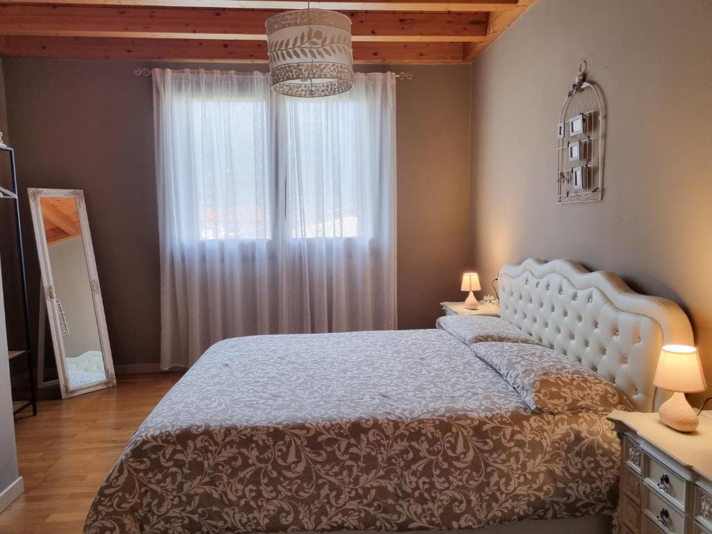 Postel nebo postele na pokoji v ubytování Loft Civico 12