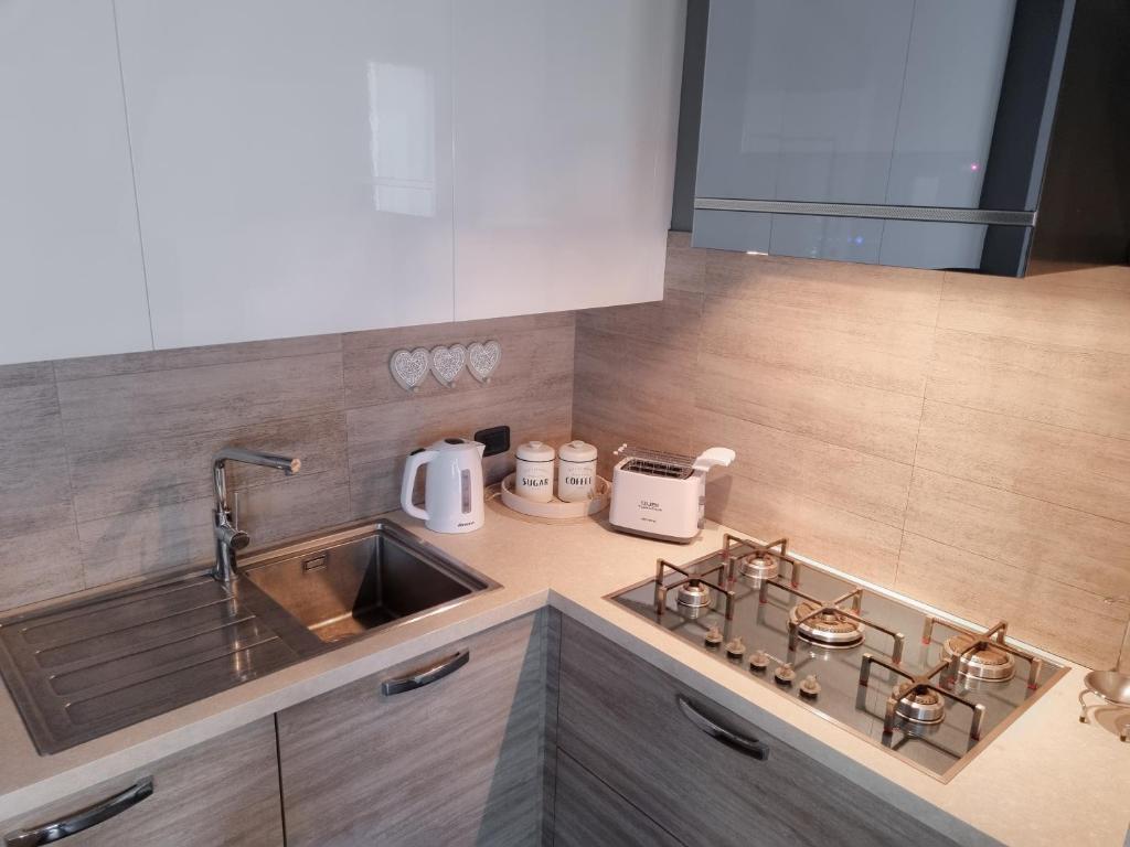 Kuchyň nebo kuchyňský kout v ubytování Loft Civico 12
