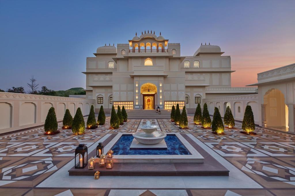 a building with a fountain in the middle of a courtyard at Mementos by ITC Hotels Jaipur in Jaipur