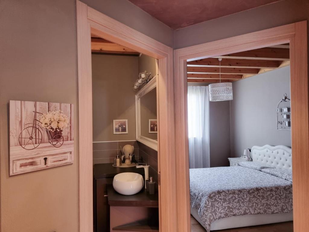 Postel nebo postele na pokoji v ubytování Loft Civico 12