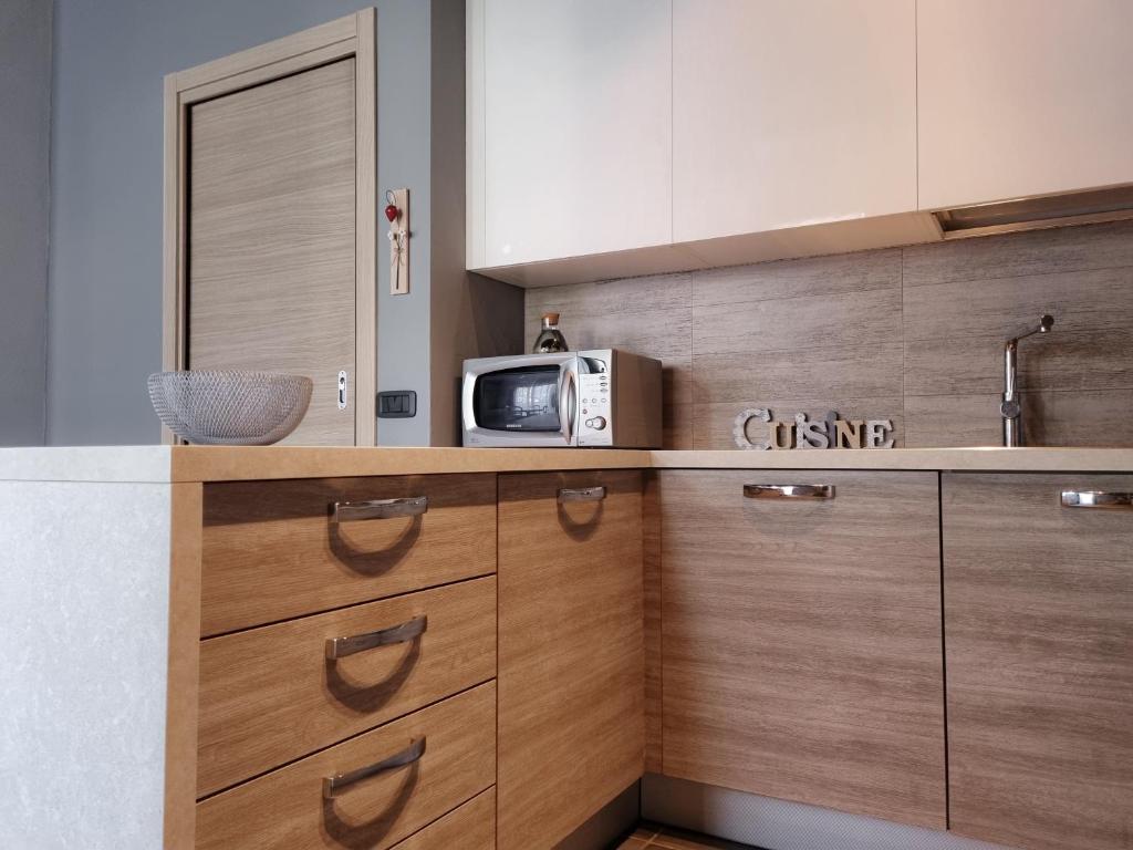 Kuchyň nebo kuchyňský kout v ubytování Loft Civico 12