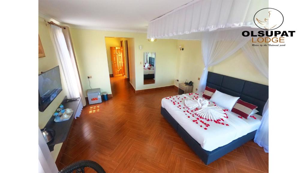 Postel nebo postele na pokoji v ubytování Olsupat Lodge