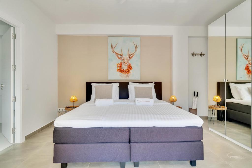 Postel nebo postele na pokoji v ubytování Casa la Naranja Boutique B&B