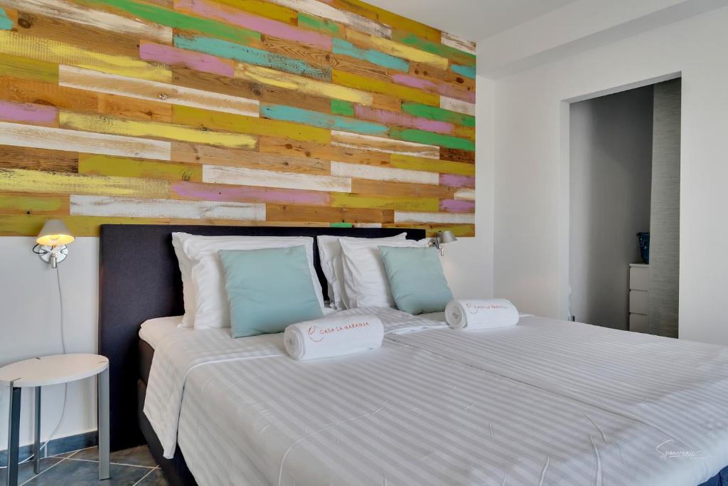 Postel nebo postele na pokoji v ubytování Casa la Naranja Boutique B&B