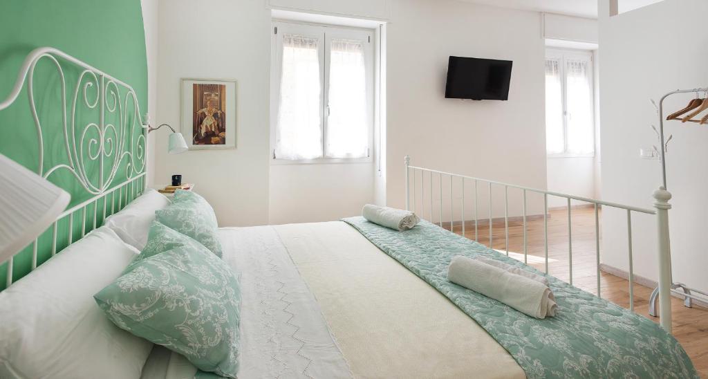 Postel nebo postele na pokoji v ubytování Ombra i Sol apartments