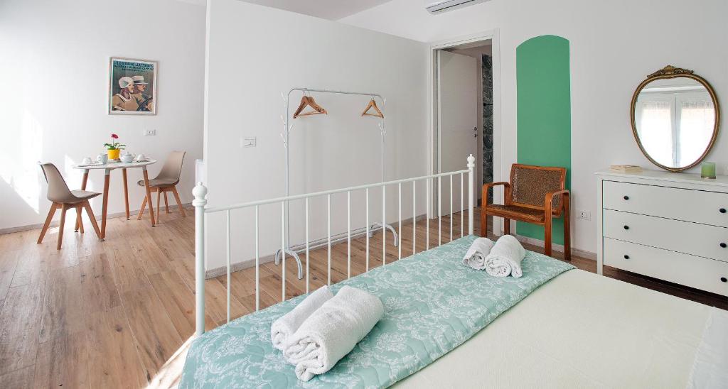 Postel nebo postele na pokoji v ubytování Ombra i Sol apartments
