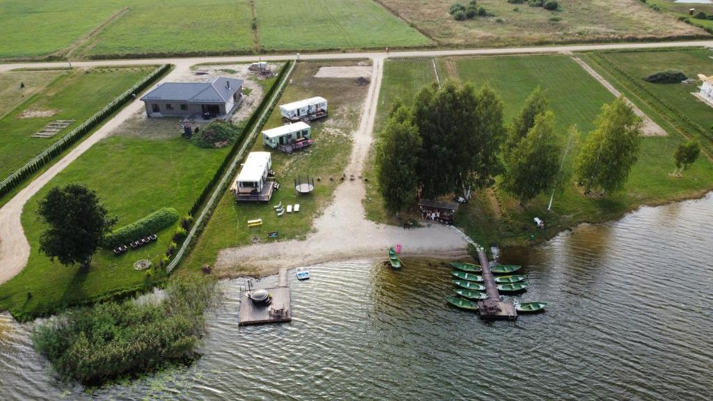 an aerial view of an island in the water at Jaundzirnieki in Valdemārpils