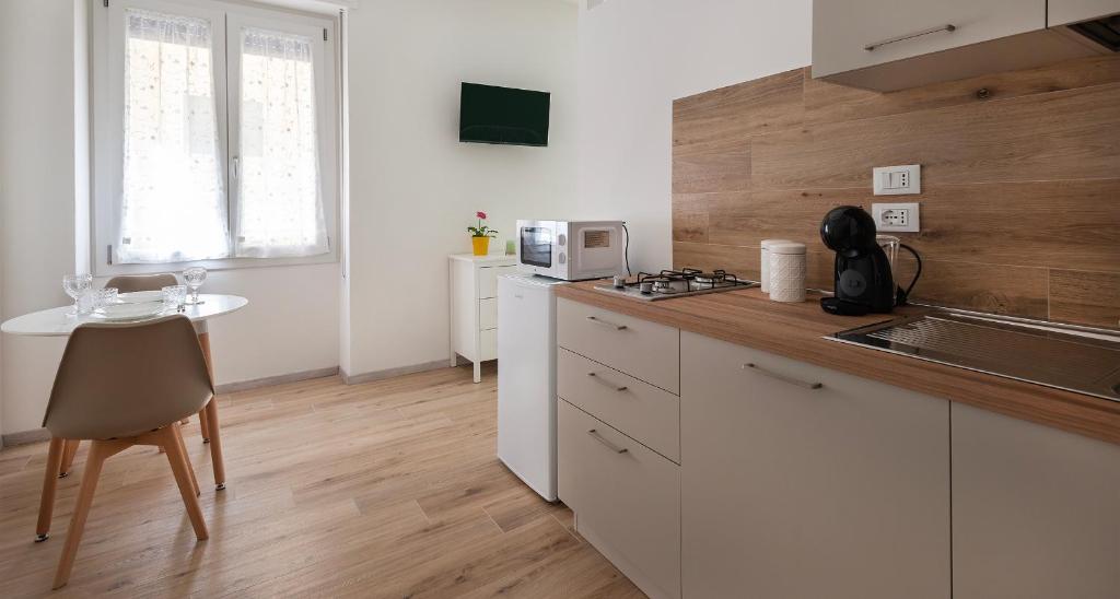 Kuchyň nebo kuchyňský kout v ubytování Ombra i Sol apartments