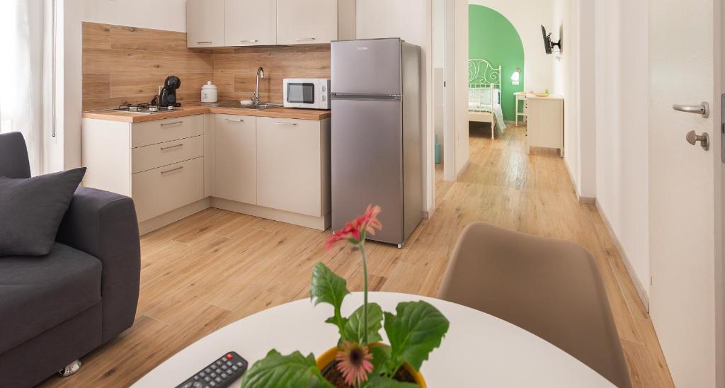 Kuchyň nebo kuchyňský kout v ubytování Ombra i Sol apartments