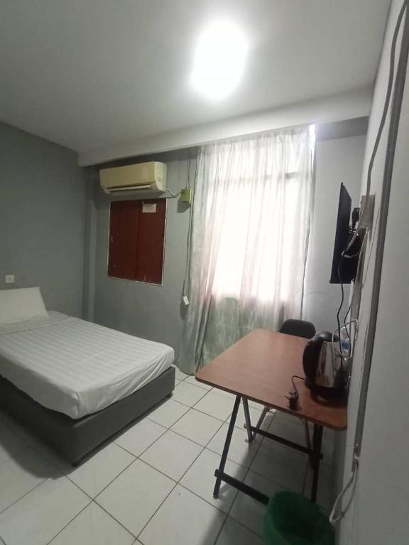 Postel nebo postele na pokoji v ubytování Hotel Iramanis