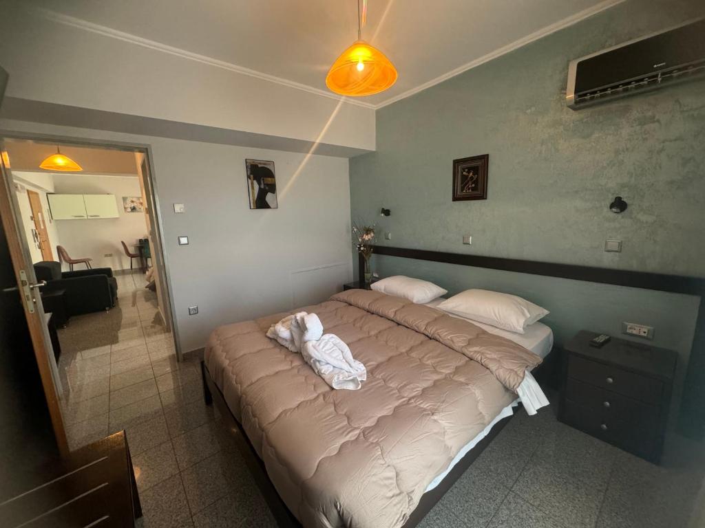Postel nebo postele na pokoji v ubytování Comfort Hotel Apartments