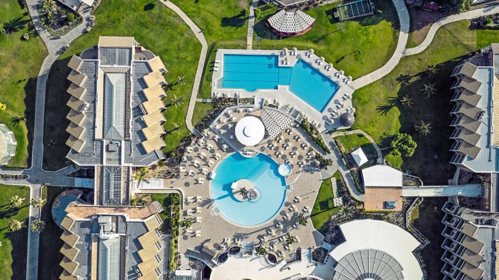 an overhead view of a pool at a resort at TUI Magic Life Candia Maris - Adults Only in Amoudara Herakliou