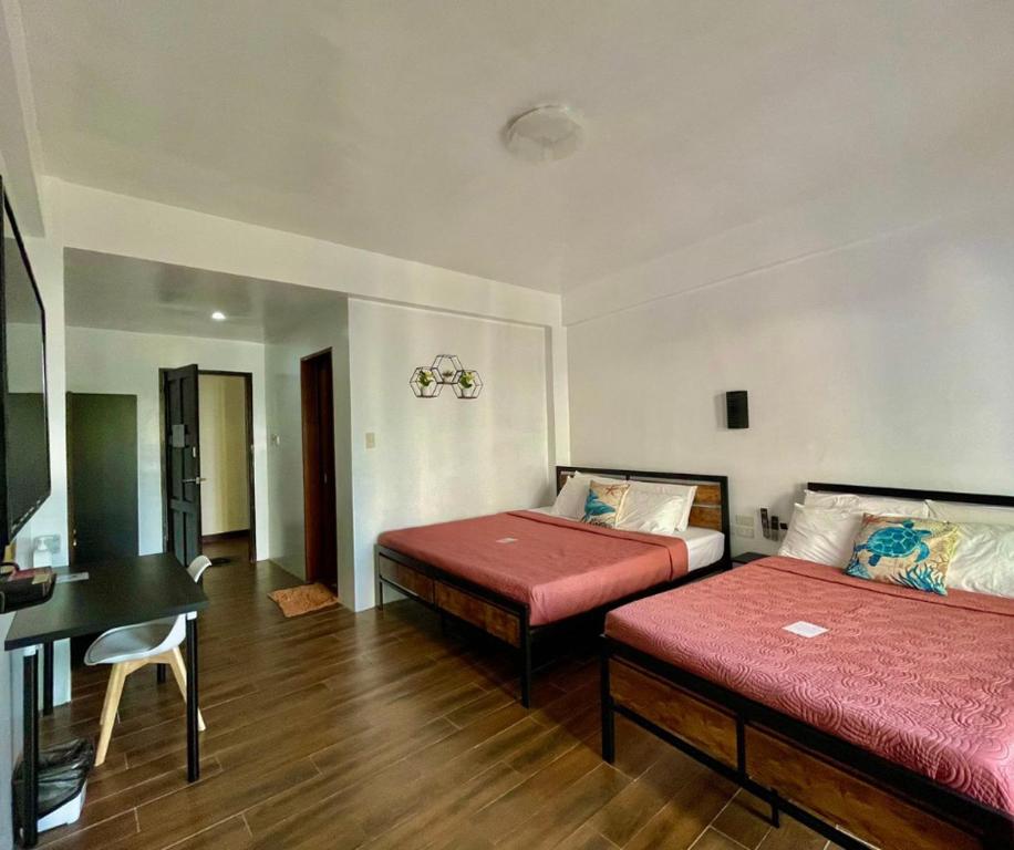 Arkipelago Beach Resort客房内的一张或多张床位