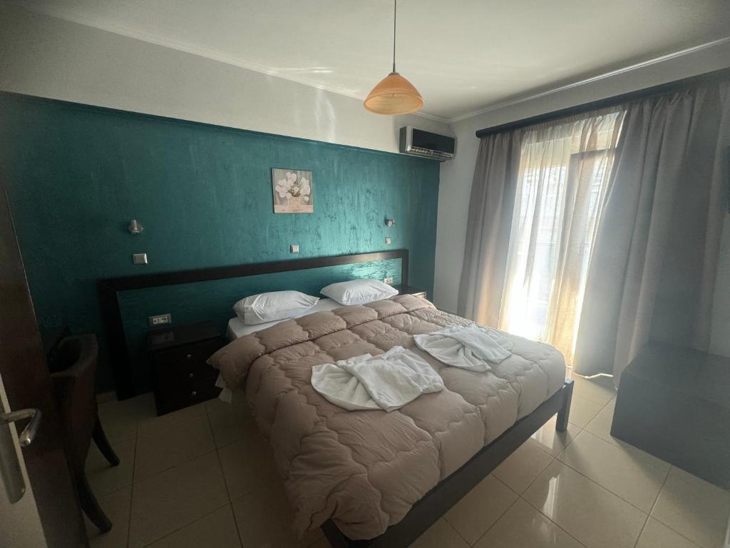 Postel nebo postele na pokoji v ubytování Comfort Hotel Apartments
