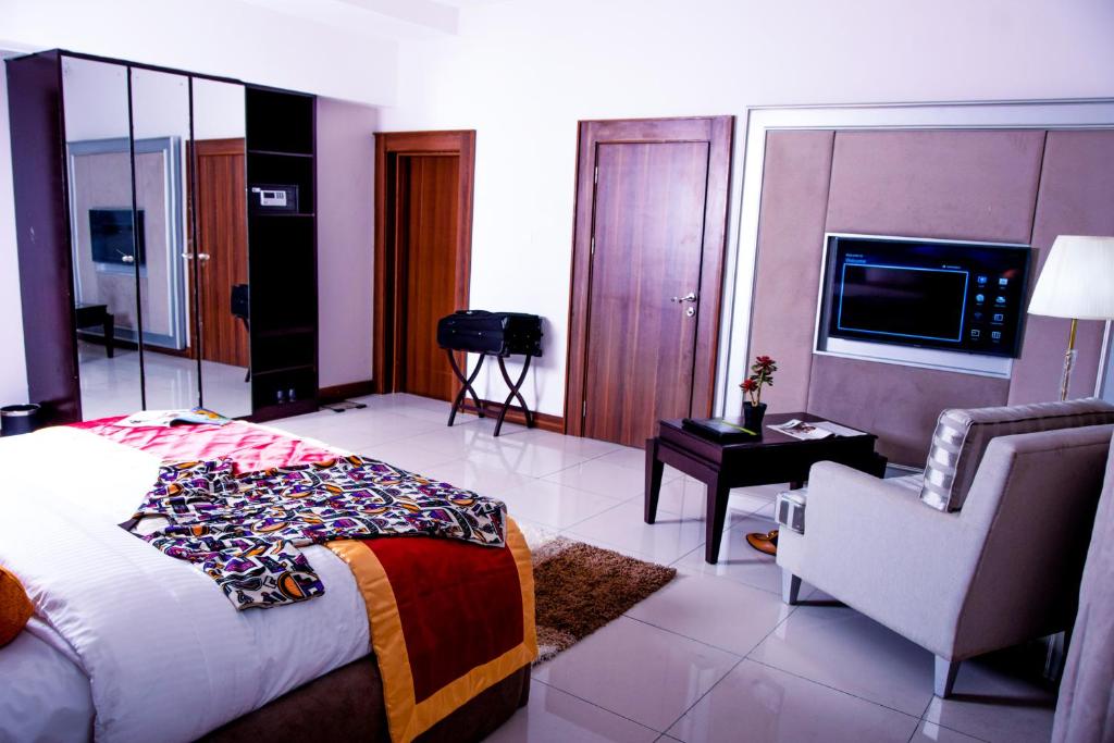 Postel nebo postele na pokoji v ubytování LIMEWOOD HOTEL