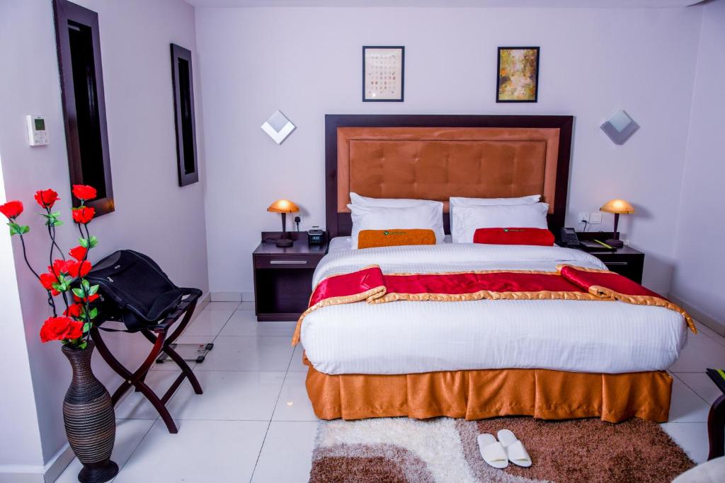 Postel nebo postele na pokoji v ubytování LIMEWOOD HOTEL