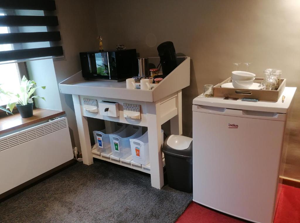 Kuchyň nebo kuchyňský kout v ubytování Une Chambre à Foyr ?