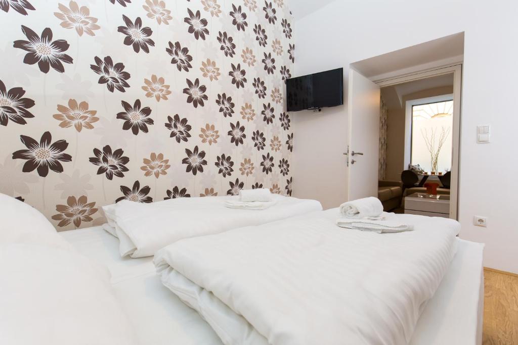 Posteľ alebo postele v izbe v ubytovaní Vienna Stay Apartments Belvedere