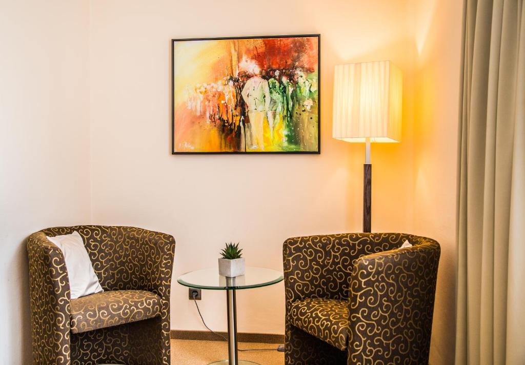Posezení v ubytování Hotel Admiral am Kurpark
