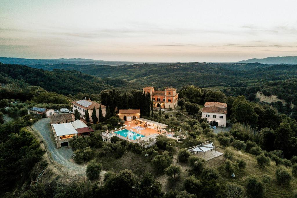 an aerial view of a house with a swimming pool at Villa Lena in Palaia