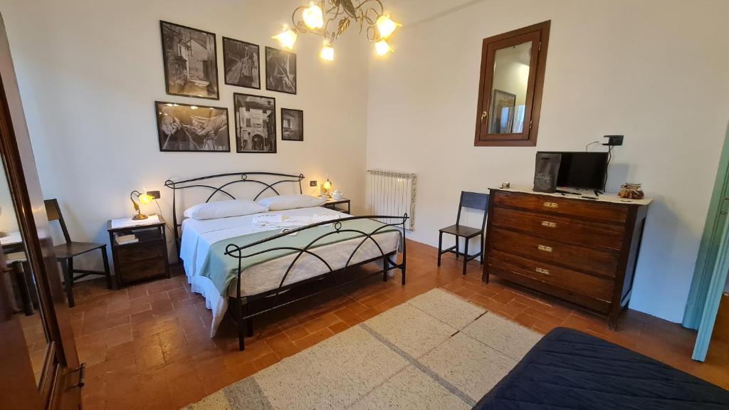 Postel nebo postele na pokoji v ubytování Casa delle rondini