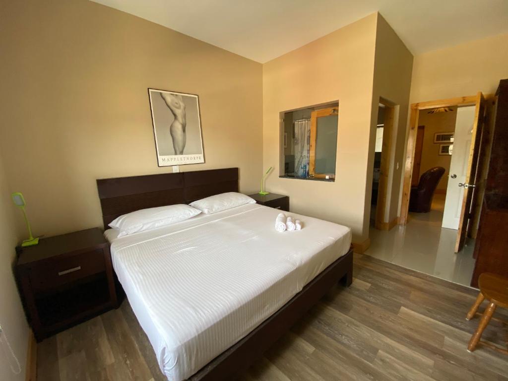 Postel nebo postele na pokoji v ubytování Spencer Residencial QUARTOS