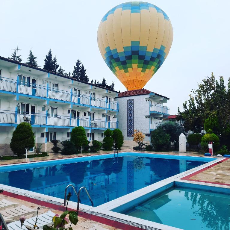 Bazén v ubytování Uyum Hotel nebo v jeho okolí