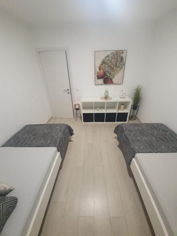 Postel nebo postele na pokoji v ubytování Holiday Home Nikol