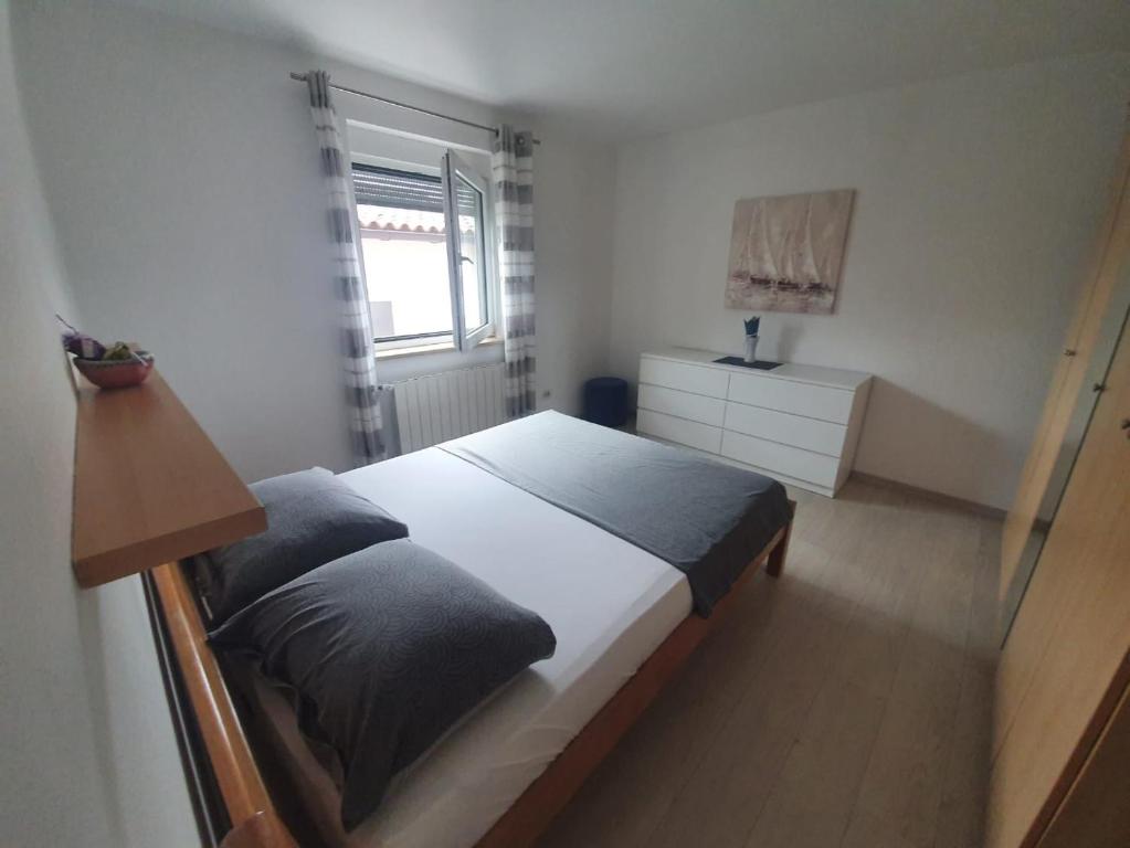 Postel nebo postele na pokoji v ubytování Holiday Home Nikol