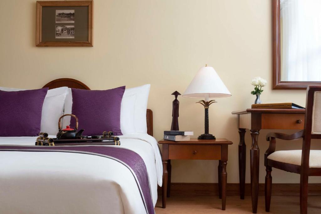 Postel nebo postele na pokoji v ubytování Avani Hai Phong Harbour View Hotel