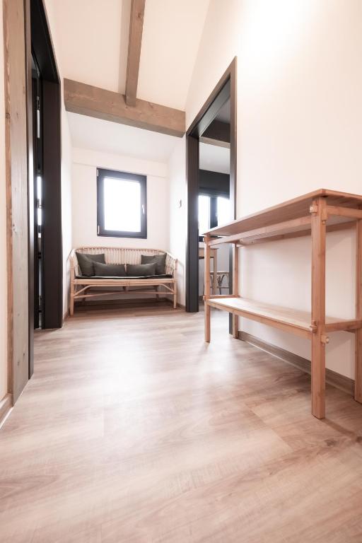 Postel nebo postele na pokoji v ubytování Apartmány Trojice