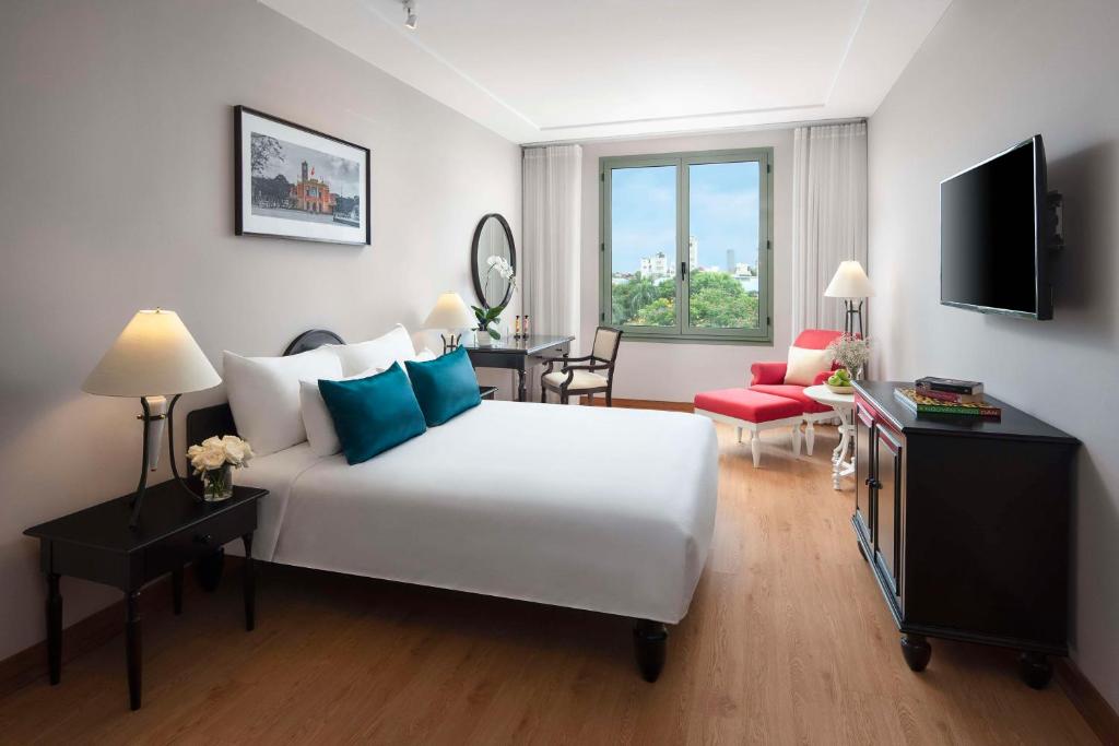 Postel nebo postele na pokoji v ubytování Avani Hai Phong Harbour View Hotel