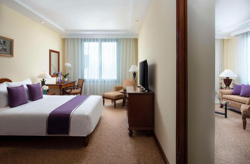 Postel nebo postele na pokoji v ubytování Avani Hai Phong Harbour View Hotel