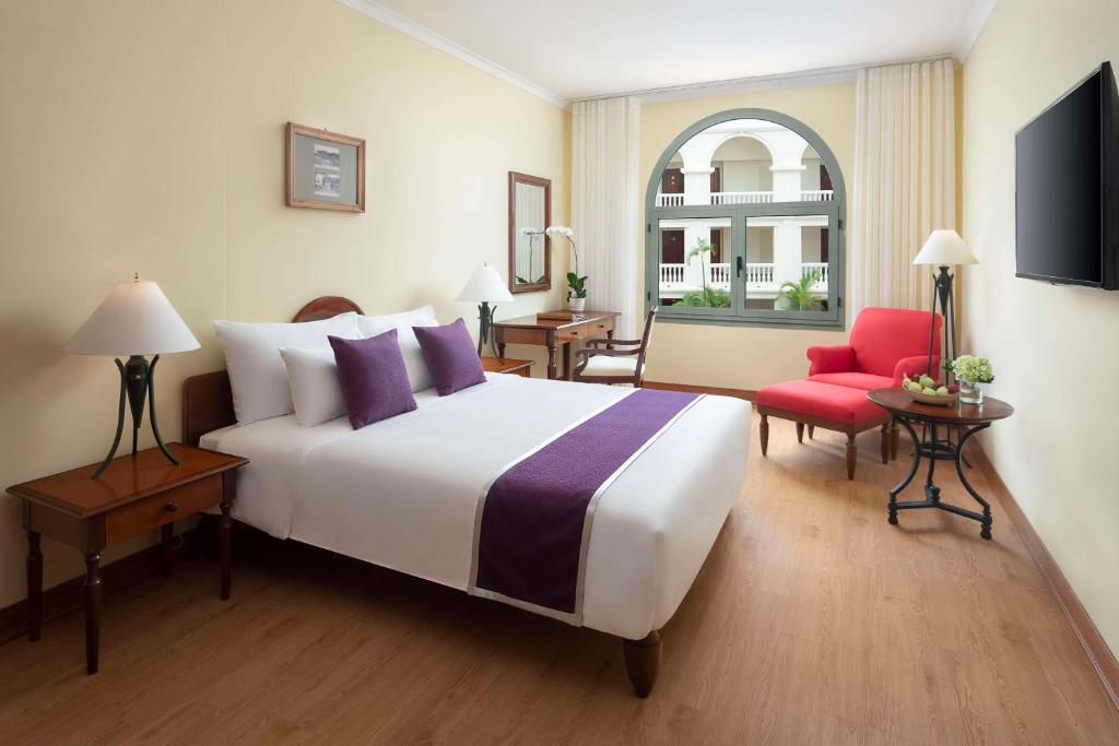 Postel nebo postele na pokoji v ubytování Avani Hai Phong Harbour View Hotel