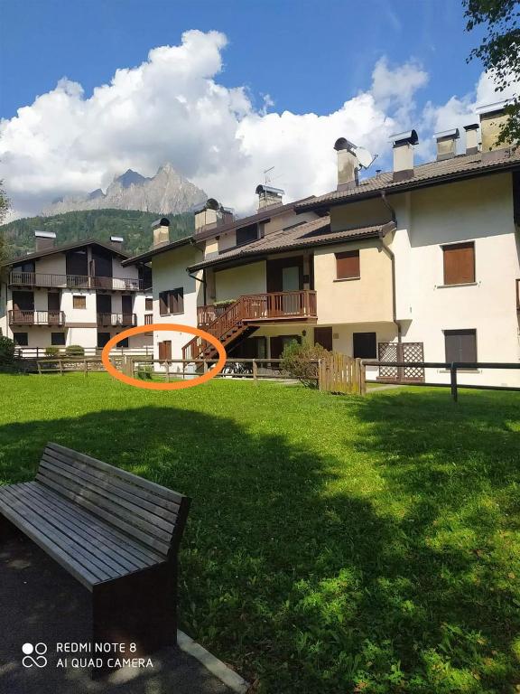 an orange frisbee in front of a building at La casa dello scoiattolo primierotto in Tonadico