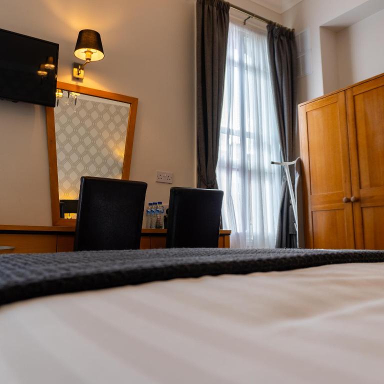 Postel nebo postele na pokoji v ubytování Eccles Townhouse