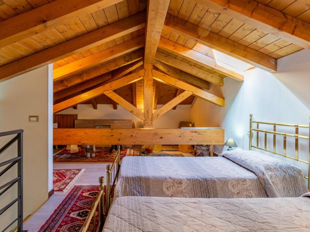 Łóżko lub łóżka w pokoju w obiekcie Holiday Home Carmen by Interhome