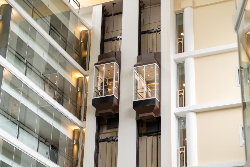 a view of the side of a building with balconies at Solna Park & Hotel in Solna